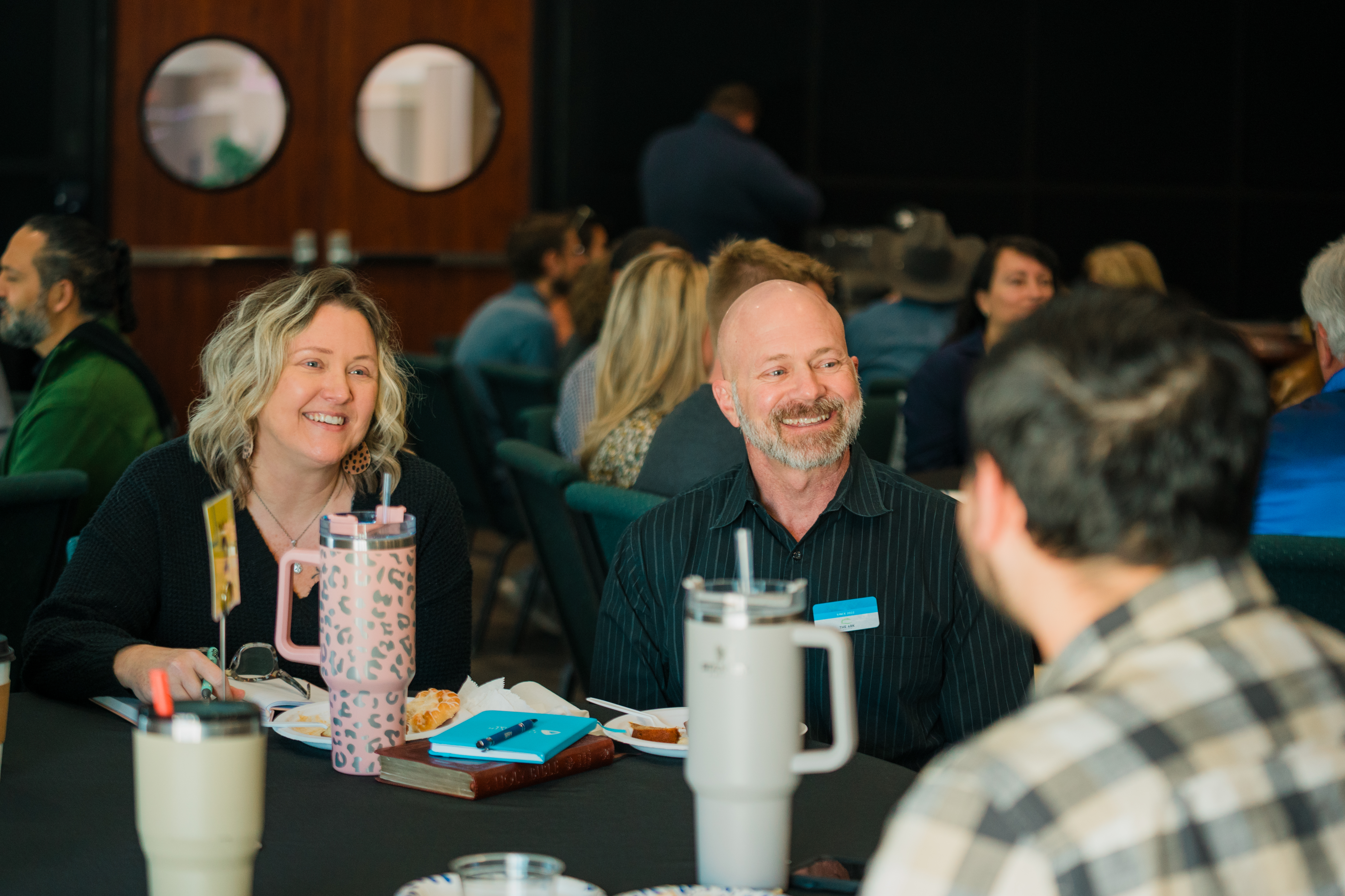 couple engaging in bible study group