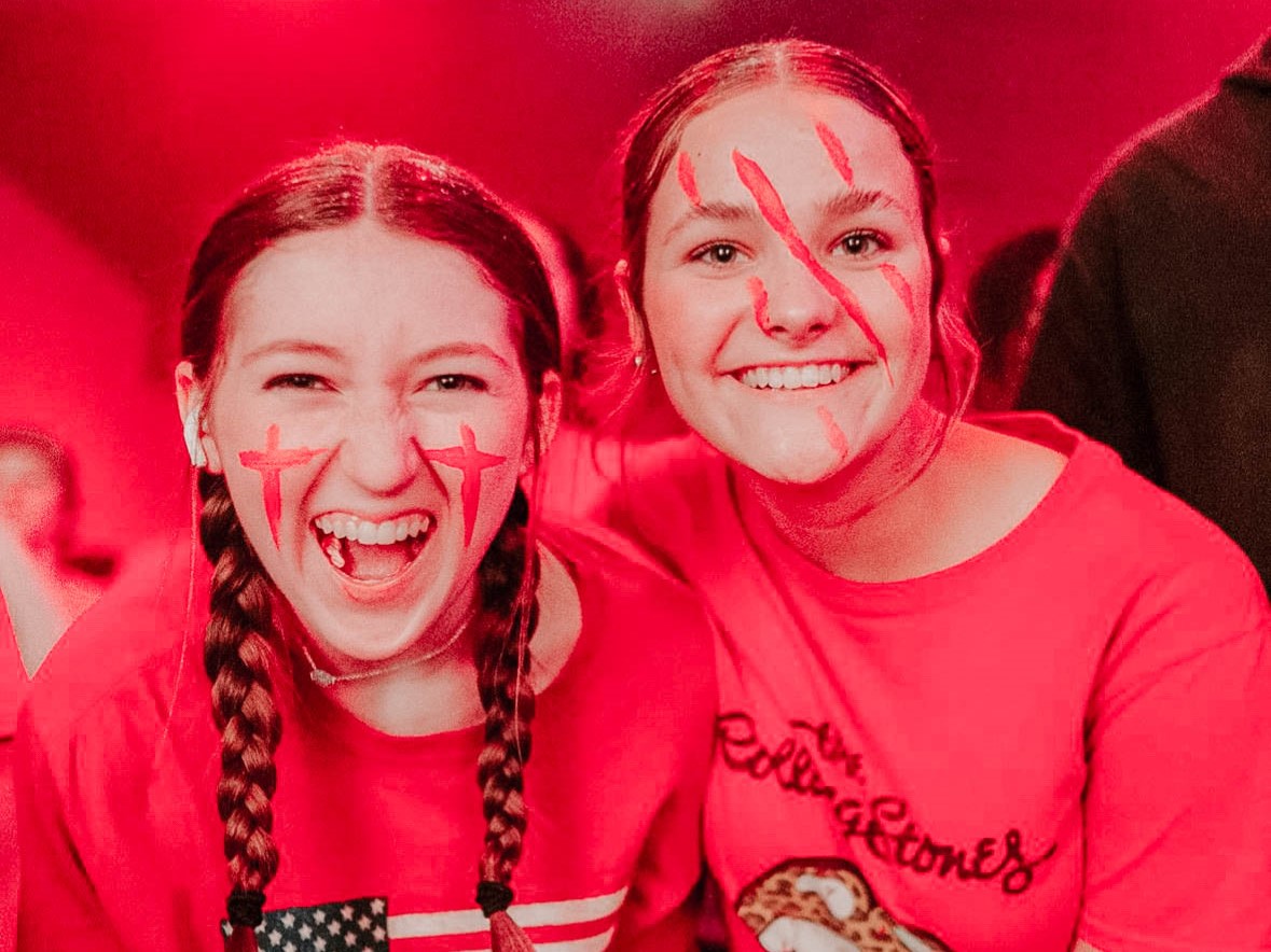 female students posing for the camera during fun youth group activities